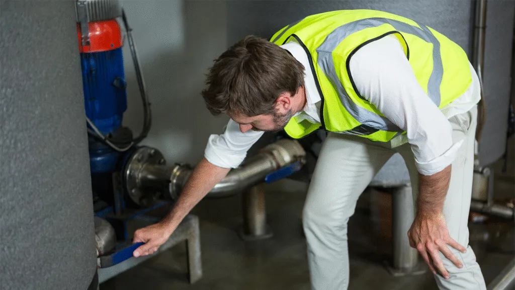 man checking the valves